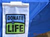The softball game aims to raise public awareness about organ donation and organ transplantation at the hospita