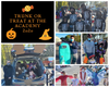 Trick-or-treaters and trunks enjoying Halloween at the Academy