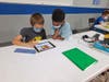 Study Hall students reading on a tablet 