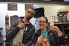 Teachers Julie Klaput and Jeron Shelton have a blast making Vanilla Cones during McTeacher’s Night