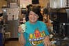 Eight-Grade teacher Missy Craig makes a Shamrock Shake at McTeacher's Night