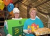 Teacher Cheryl Moglia dressed as an apple pie for this event, alongside her selling pies was teacher Linda Reck