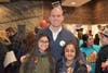 Nate Molby welcomes Keller students Brisa Jasso and Haley Kharvari to McTeacher's Night    