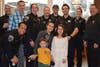 Sarah and David Contis with all the Mount Prospect Police officers at Cocoa with a Cop