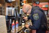 Officer Zagorski makes a perfect Hot Chocolate to serve to the community at the Niles McDonald's