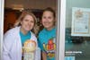 Teachers Erin Allsup and Mandy Toomey work hard at the Drive-Thru.