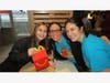 Field Elementary fourth grade student Emily Rude smiles with teachers Natalie Furfaro and Vicki Moran during the Third A