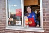 Maria Haines works the drive-thru at McTeacher's Night