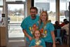 - Teachers Mark Shydlowski and Lindsay Calanca with their helper Addison Calanca and a delicious Shamrock Shake! 
