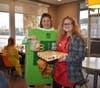 "McPie" Teacher Carrie Horlock and Pie helper kellie Hohlfeld have a blast selling pies to their school families