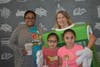 RC Hill teachers Natasha Yancy and Lori Yates greet students Amy and Miley Morfin at McTeacher's Night   