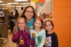 Harper Matteucci, Presley Grimpe, and Charlize Rehana have a blast at Indian Grove McTeacher's Night.