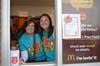Colleen Moreno and Dana Nathan have fun at the Drive-Thru to raise funds for their students.