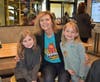 Evergreen Principal Laura Pfanenstiel takes a picture with students Mia Oprochta and Kennedy Jeffery