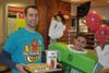Chris Pietroski passes out apple pies with student Matt Michalski starring as the apple pie! 