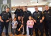 Hisham and Widad Raddad enjoyed Vanilla Cones at McDonald's from the Niles Police.