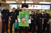 Logan Gallegos had a delicious Vanilla Cone and took his picture with all the Niles Police. 