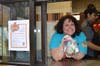 Melanie Short works hard at the Drive-Thru to support Chaney Monge