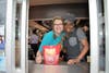 Amy Herring poses with McDonald's employee LaTavia James while working the drive-thru at McTeacher's Night