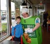 Ben Vega is surprised to see teacher Rhonda Wallace in an apple pie costume