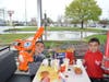 William and Andy Arreola enjoyed watching Ryan with RC Juggles create their balloons.