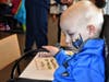 Gage Gessner was a little surprised to see Batman on his face.