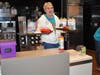 Mrs. Stone happily delivers meals to school families during McTeacher's Night​
