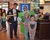 Ryann and Harper Toopes Were excited to see teachers Park and Verdon selling pies at McTeacher's Night