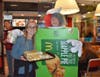 kristin Verdon sells pies alongside Mike Park who is dressed in an Apple Pie Costume with some "crazy" hair