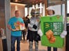 Pie Selliing team Argabright and Hardy pose with School mascot the Knight during McTeacher's Night in Elburn