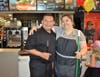 Batavia McDonald's General Manager Omar Daniel and Shift Supervisor Adriana Araujo help keep the restaurant clean 