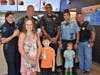Madison Pickard-Spalding with Lucas and Kayla Peterson were very excited to take a picture with some of the Bloomingdale Police Force