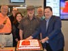 ​Cake cutting at the Dekalb McDonald's. Pictured: Mayor Jerry Smith, Tony Lardas, Julie Basden, John Lardas Sr., Johnny Lardas, and William Basden.