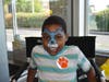 ​Jayceon Howard looks adorable after his face painting by Anna with RC Juggle