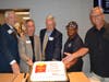 The cake cutting for the new Aurora McDonald's on Galena Blvd. Pictured: Richard Schmitt McDonald's owner, Alderman Franco, Ed Schmitt McDonald's owner, Alderman Bugg, and Deputy Mayor Chuck Nelson.
