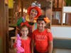 ​Isabella and Gianfranco Mariani get a picture with Strawberri the clown at the Bloomingdale McDonald's on Stratford Dr.