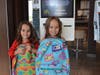 Mia and Ella Curescu take home backpacks from the Morton Grove McDonald's back to school event.