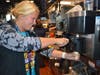 Kristy Argentine makes cones for her students.