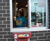 Mrs. Duffy works the Drive-Thru