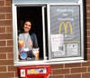 Mrs. Ocampo Works the Drive-Thru at the Larkin Avenue McDonald's in Elgin