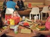 Emily and Kirlyam and Alvarez and Diana Campuzano, enjoy their delicious meal from McDonald's