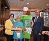Wood Dale Jr. High Principal Skarzynski and Superintendent Dr. Corbett take a picture with Pie Teacher Halverson and pie selling teacher Difiglio at McTeacher's Night 