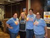 Abbott MS teachers take a break from fundraising to get a group picture during McTeacher's Night