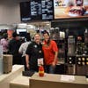 Mrs. Anderson and Ms. Consiglio are eager to get to work at the Batavia McDonald's and raise some funds for Louise White School