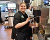 Mrs. Anderson has a blast making Ice Cream treats during McTeacher's Night