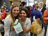 Alex Partipilo and Lijia Lukove deliver food to customers.