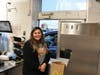 Jocelyn Gonzalez delivering food at the drive-thru during MacArthur Spanish Academy’s McTeacher’s Night at the Hoffman Estates McDonald’s.