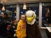 Baldy The Eagle, Mascot, and Enders-Salk student Kallie Tabata are happy to see each other at McTeacher's Night
