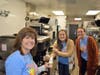 Ms. Beth, Ms. Jackie, and Ms. Aubreyall have a blast making Ice Cream treats during McTeacher's Night
