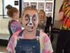 Makenzie Makula is so happy to get her face painted by Anna from RC Juggle at the Niles McDonald's 